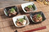 大分県の特製タレで漬け込んだ4種類のりゅうきゅう漬けをご飯に盛り付けた海鮮丼の画像。色鮮やかで豪華な大分名物の漬け丼セットを通販でお取り寄せ。