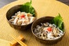 豊後とらふぐの皮（てっぴ）を刻みネギとポン酢で和えた調理例画像。コリコリとした食感が特徴のふぐ皮もセットで楽しめる、大分名物。
