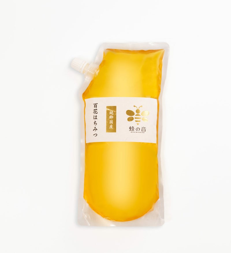 四季折々に咲く様々な花から採蜜し厳選した「国産百花はちみつ」の商品画像。時期や採蜜場所で風味が異なる、四季の恵みを感じるはちみつ。