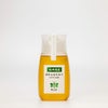 みかんの花を蜜源とした希少な「国産みかんはちみつ」の商品画像。柑橘系らしいフレッシュでフローラルな香りと、柔らかい甘さが特徴。
