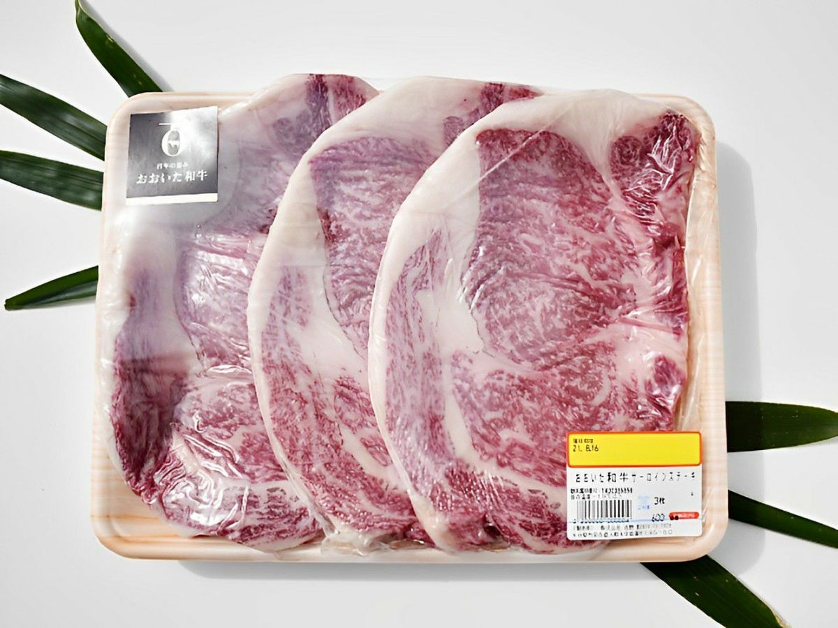大分県のブランド牛「おおいた和牛（黒毛和牛）」のサーロインステーキ肉がパックに詰められた内容量画像。ご自宅で贅沢なディナーを楽しめる、通販お取り寄せ高級和牛。